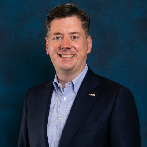Headshot of Oklahoma City Mayor and COTPA Board Trustee David Holt with blue background.