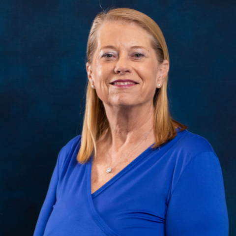 Headshot of Oklahoma City Assistant City Manager Laura Johnson with blue background.