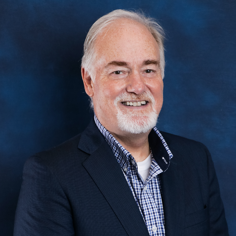 Headshot of COTPA Board Trustee Steve Hill on blue background.
